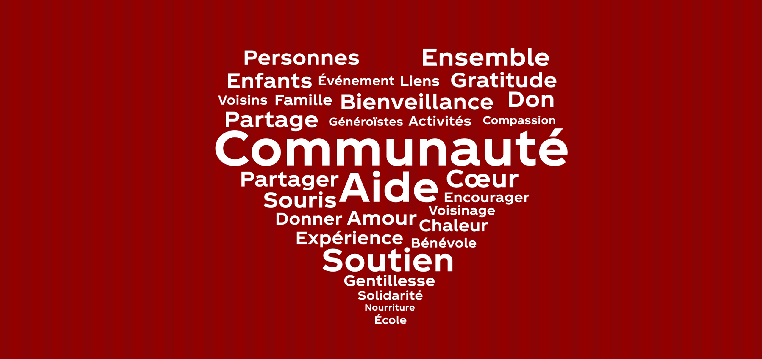 A white heart made up of kind words on a red background 