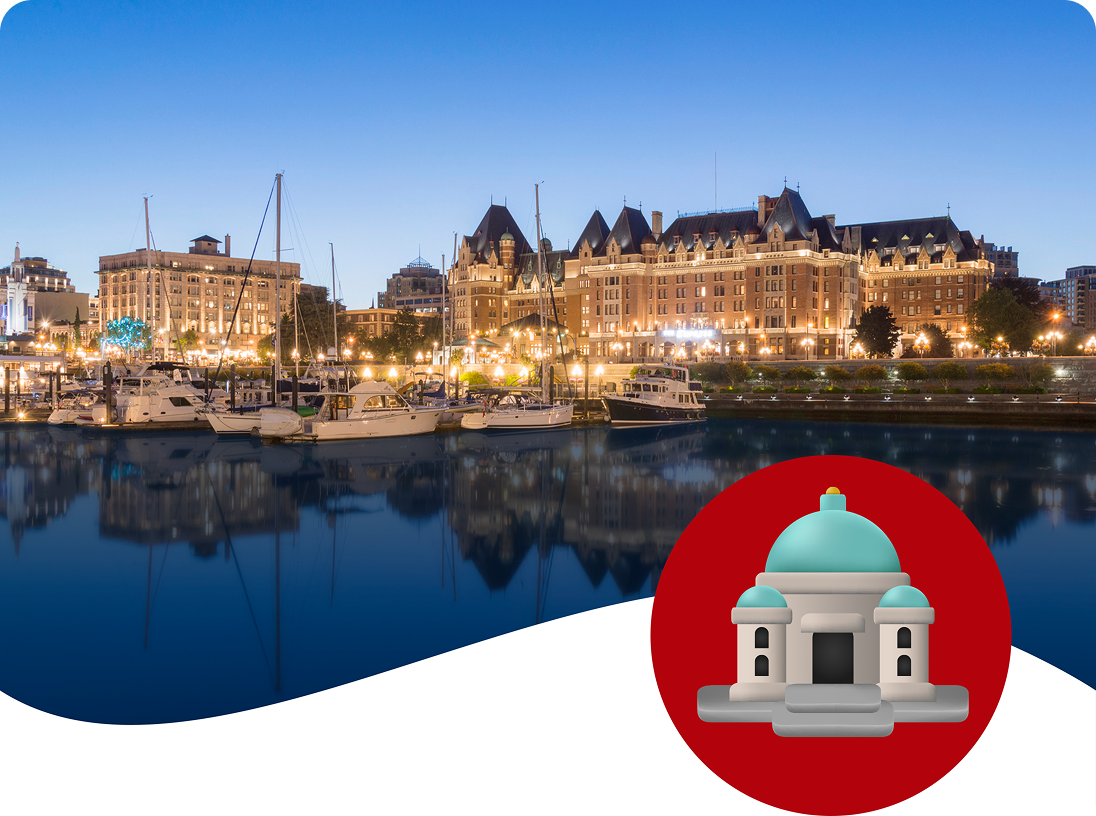 Le port intérieur illuminé de Victoria, C.-B. au crépuscule, un voyage grand prix vedette du concours d'été de Coca-Cola.