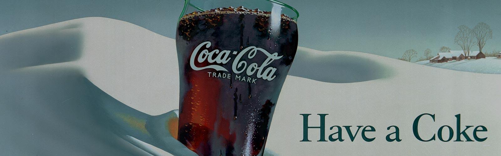 Publicité Coca-Cola avec un verre de Coca-Cola rempli.