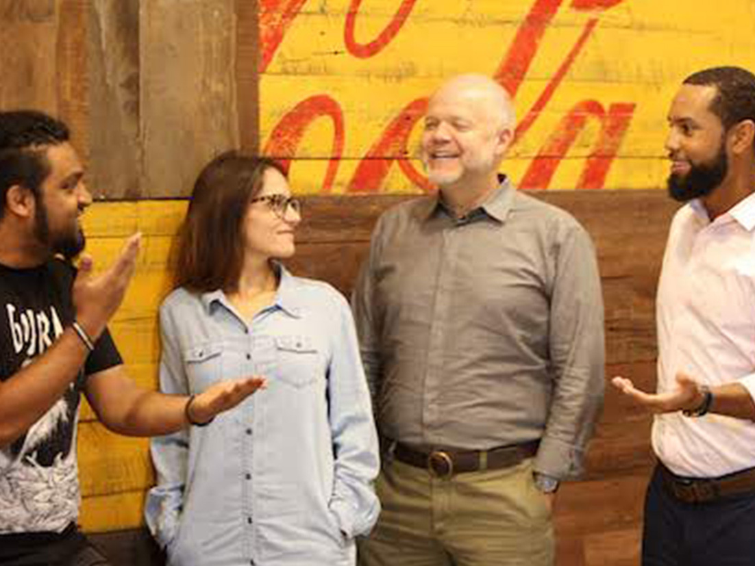 Group of people laughing together