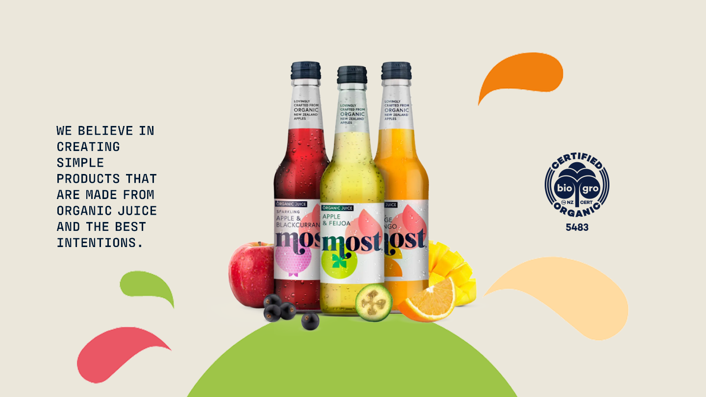 Most Organic Juice bottles on a light background