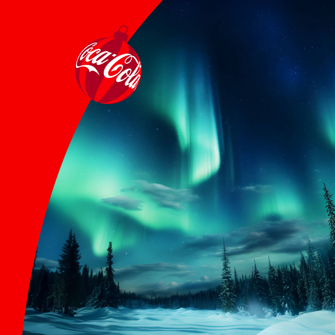 coca-cola ornament overlaying aurora borealis