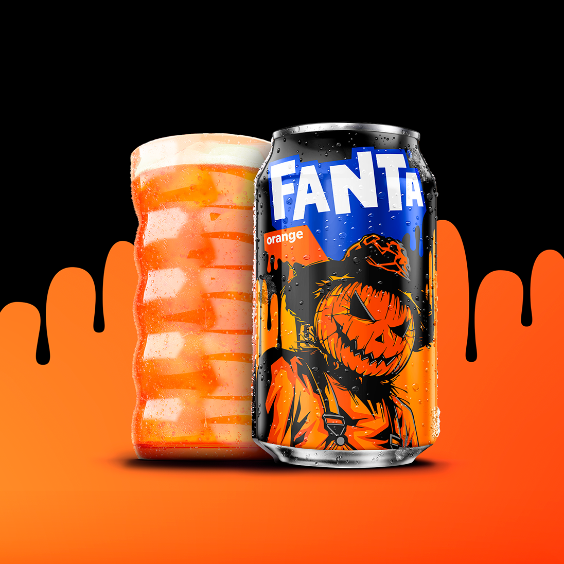Fanta Orange Halloween can featuring a pumpkin scarecrow design, displayed next to a glass of orange soda.