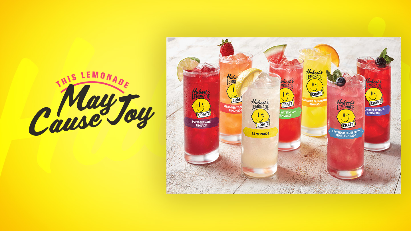 Several glasses filled with ice and different flavors of Hubert's Lemonade