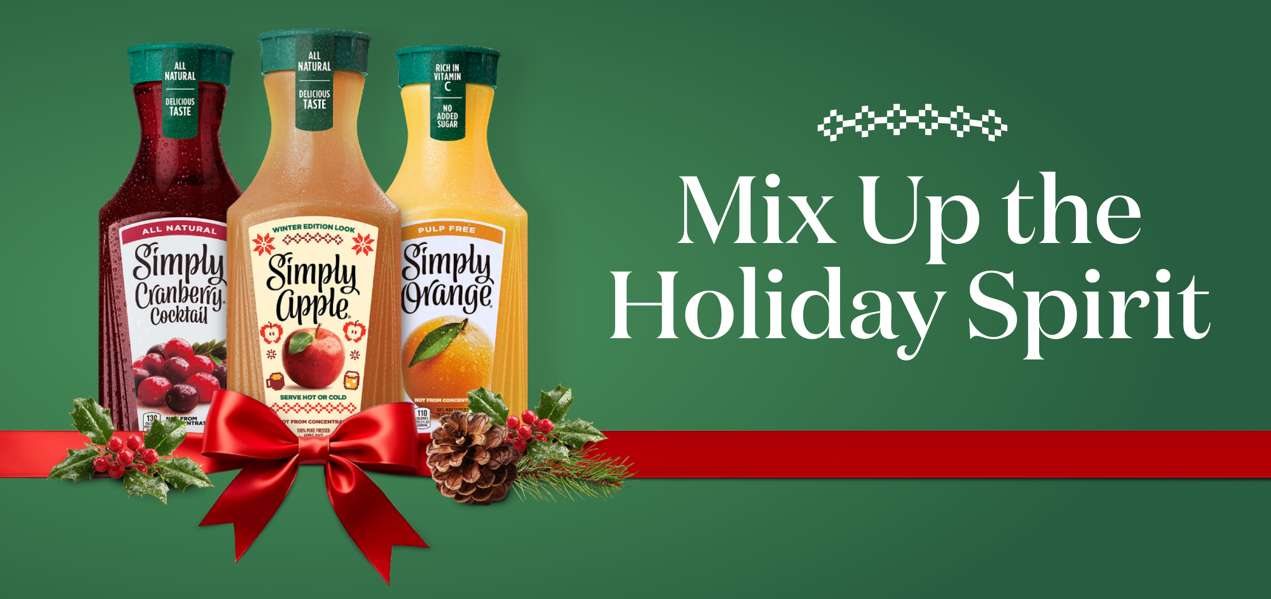 Three Simply juice bottles on the left side of a green background: Simply Cranberry Cocktail, Simply Apple in a winter edition label with a sweater pattern, and Simply Orange Pulp Free. A red ribbon with a bow runs across the image, with holly, berries and a pine cone near the bottles, and the heading “Mix Up the Holiday Spirit” appears on the right.