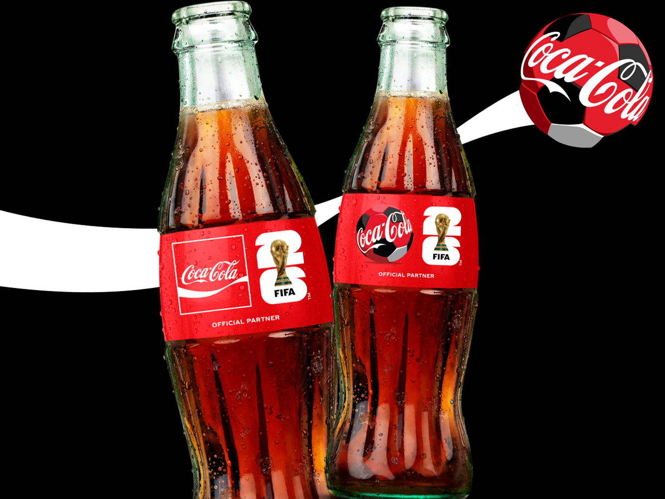 Two Coca-Cola glass bottles with limited edition FIFA World Cup labels and red soccer ball graphic, hero visual for FIFA digital hub.