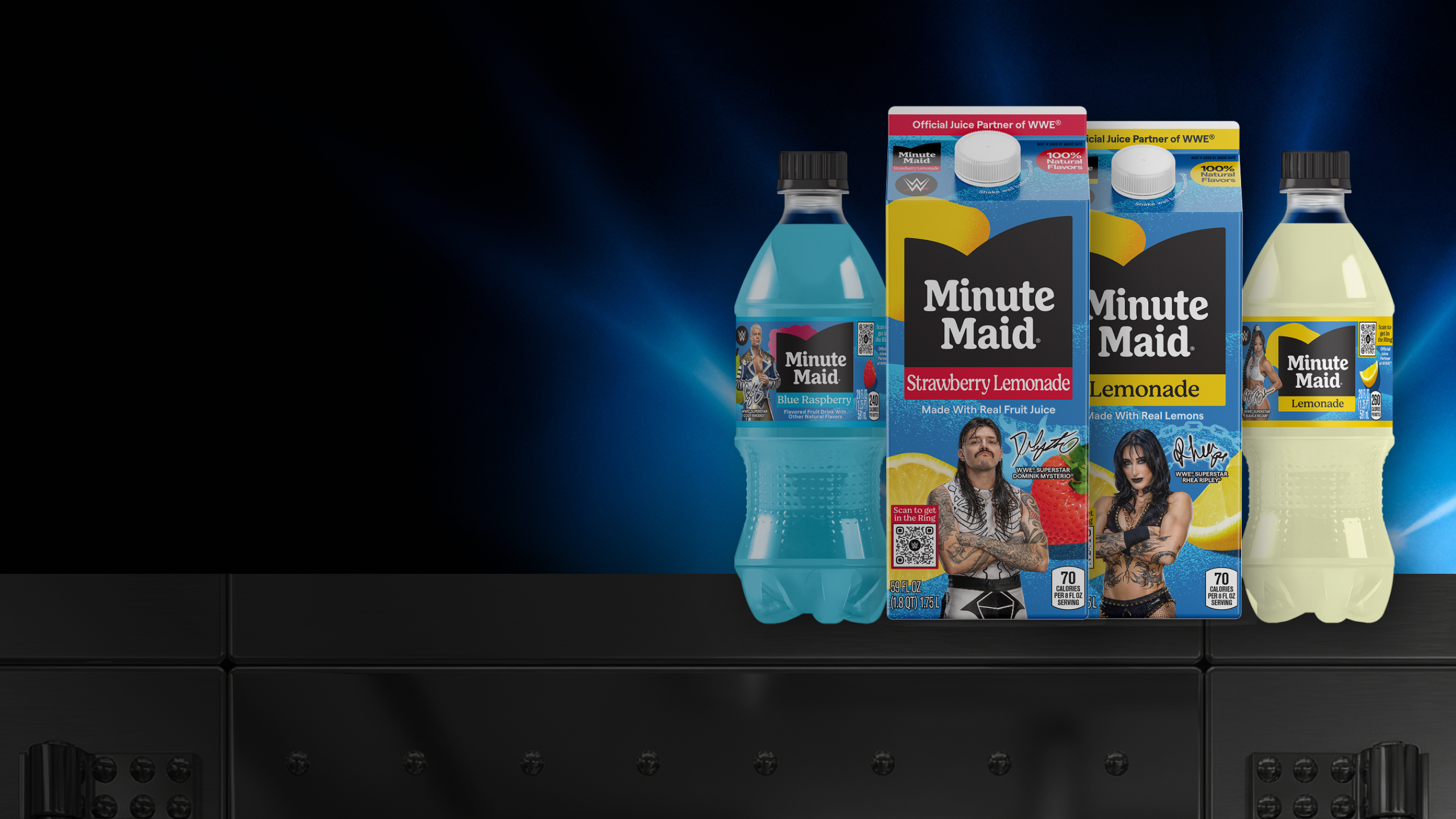 Hero shot of Minute Maid Blue Raspberry and lemonade drinks with wrestling performers on packaging against dark arena lights.
