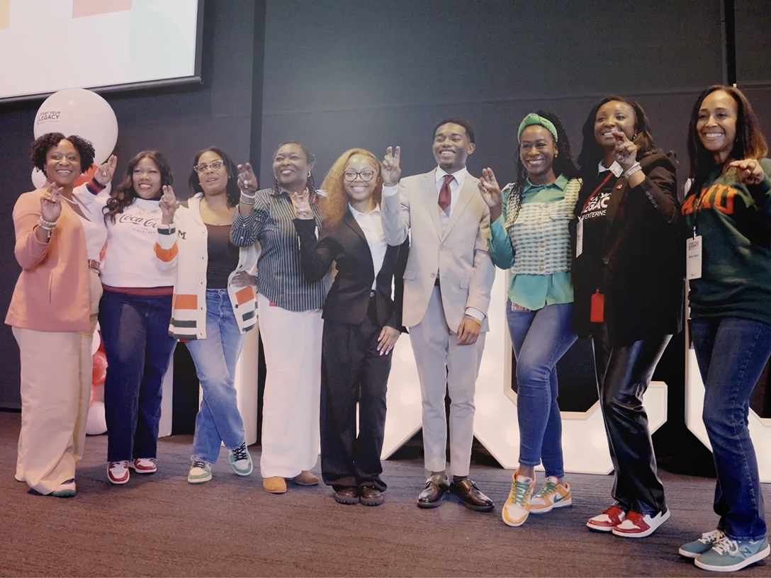 A group of HBCU students posing together during the Start Your Legacy Externship Program presented by The Coca-Cola Company