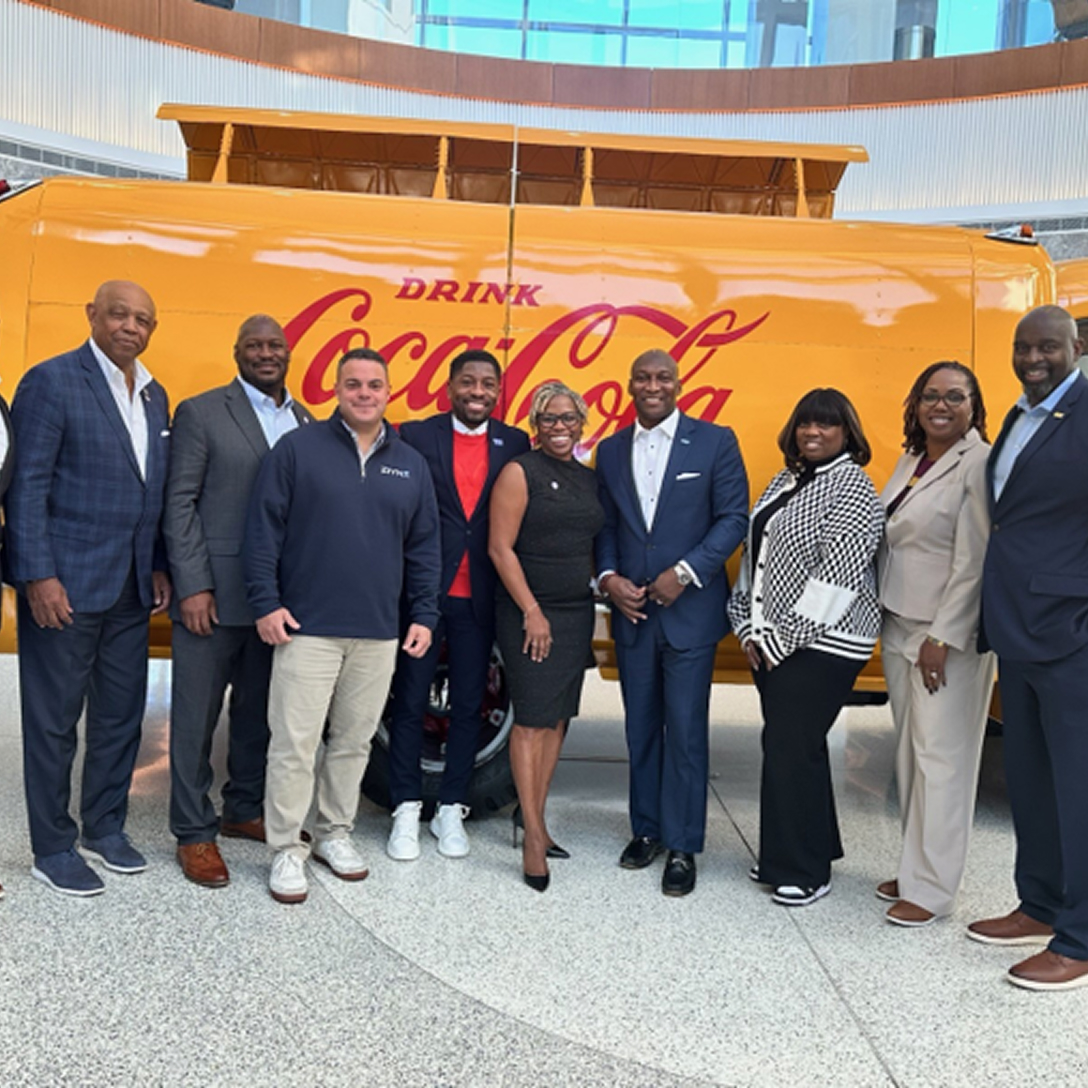 Coca-Cola representatives and HBCU partners at an official partnership event, with logos representing CIAA, SIAC, MEAC, and ESPN Events