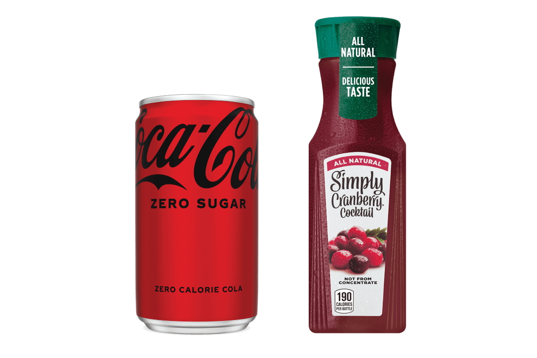 can of coca cola zero sugar and bottle of simply cranberry cocktail