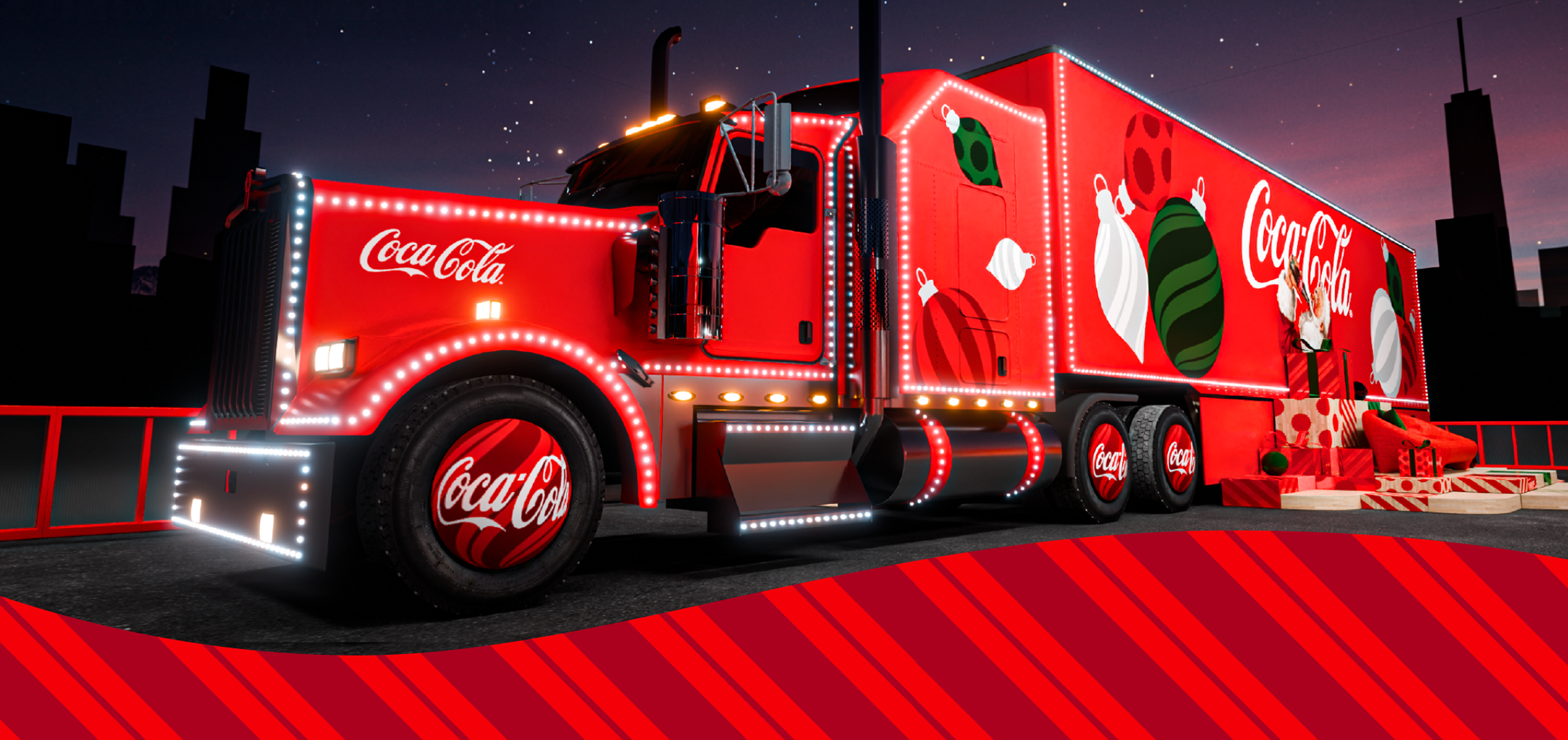 Un camión grande está decorado de rojo con luces, decoraciones y letreros festivos de Coca-Cola